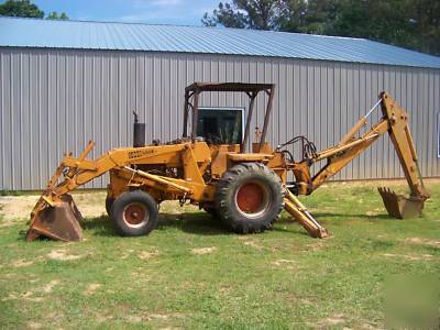 Case 580 b and 1977 hercules 21000LB. gvwr trailer