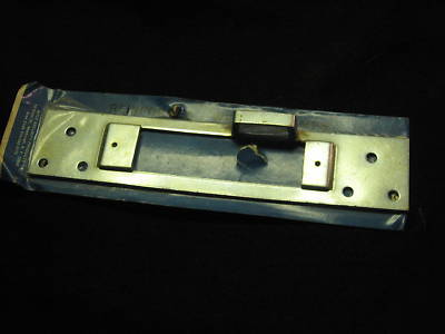 Door release strike plate high strenth afco kick in res