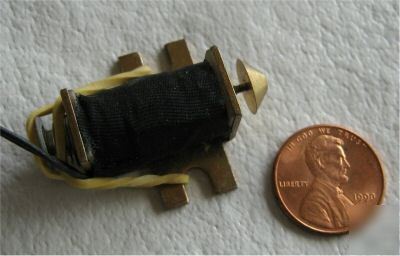 Five magnetec cc 3484 miniature solenoid actuators