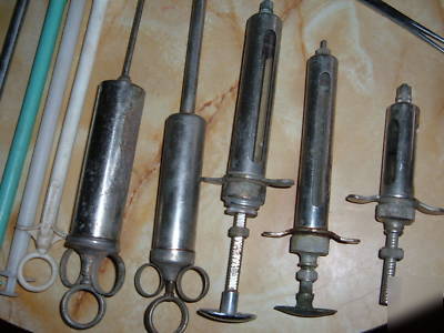 Cattle horse livestock veterinary syringe bolus clamp