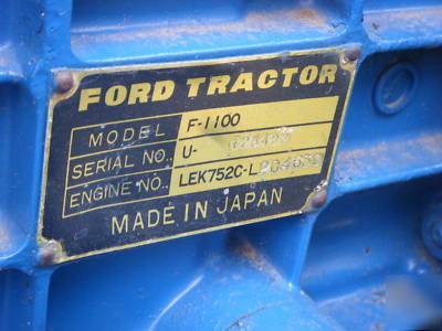 Ford 1100 diesel tractor 4X4 w/rear mower deck & plow.