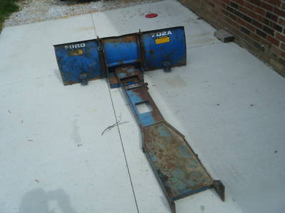 Ford 1100 diesel tractor 4X4 w/rear mower deck & plow.
