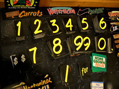 Huge lot of grocery store produce retail display signs