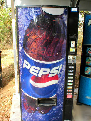 Dixie narco 600E multi-price soda vending machine..