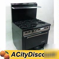 Used garland restaurant 6 eye gas range w/ oven base