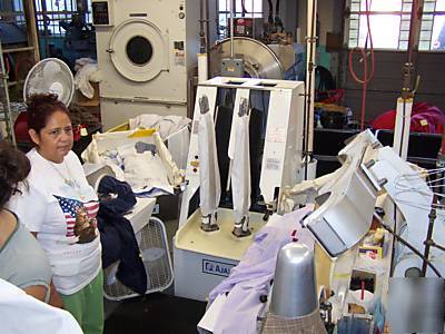 Laundry equipment commercial ajax cabinet bag sleever