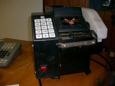 Used phoenix water activated tape dispenser e-1 E112252