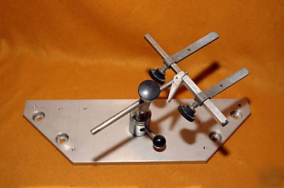 Adjustable circuit board holder w/ base