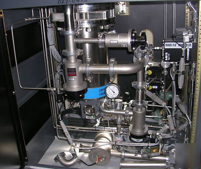 Commonwealth scientific ion beam etch/deposition system