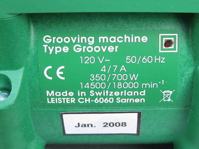 Leister powered groover machine with case used 1 job