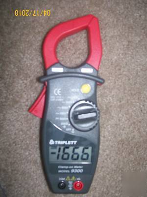 Triplett modle 9300 ac clamp on meter w/ manual