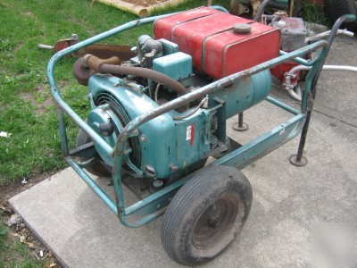 Onan 5KW gas generator on cart runs nice rv camper?