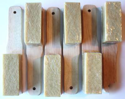 Sandpaper abrasive cleaner removes wood metal fiberglas