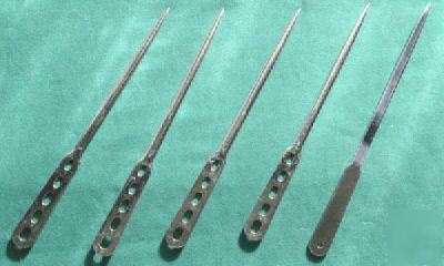 4 letter openers with holes