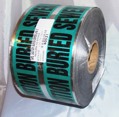 Caution sewer line buried below warning 6'' tape