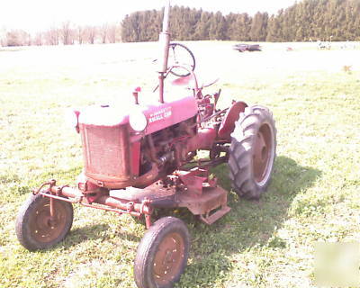 Farmall cub 1949? all original with many attach & manua