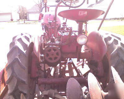 Farmall cub 1949? all original with many attach & manua