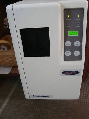 Unimark sprite ticket printer ATB2 with ticket bin 